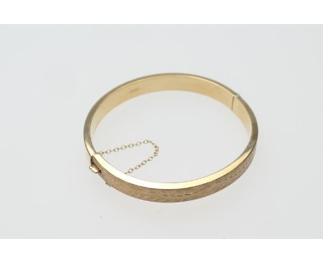 9ct gold hinged bangle, Birmingham 1969, with fern leaf decoration, cuff size 62mm, weight approx. 12.9g (Please note conditi