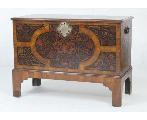 Walnut and marquetry inlaid chest on stand, in the William and Mary style, inlaid to the top and front panel with flowers and