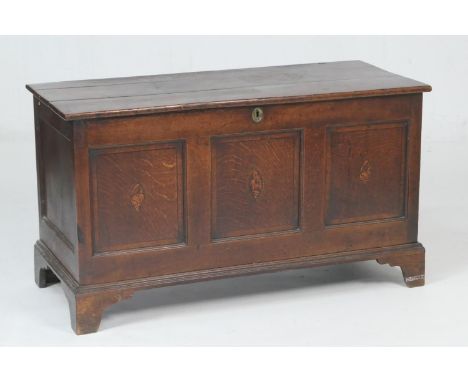 George III oak and inlaid linen box, circa 1790, three plank top over a three recessed panel front inlaid with conch shell in