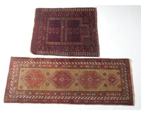 Persian small woollen runner, brown field with three madder lozenge shaped medallions, within a fawn and madder border, size 