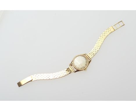 Omega lady's 18ct gold wristwatch, champagne dial with baton numerals, signed, calibre 244 manual wind movement, 23mm diamete