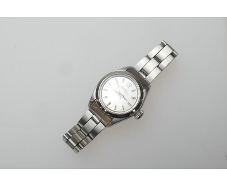 Rolex stainless steel Oyster Perpetual lady's wristwatch, 24mm case with silvered dial, centre sweep seconds, on original Rol