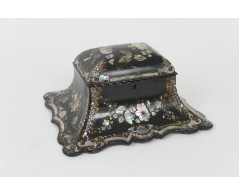 Unusual Victorian papier mache tea caddy, circa 1860, the hinged cover opening to two caddy covers, over a flared base, inlai