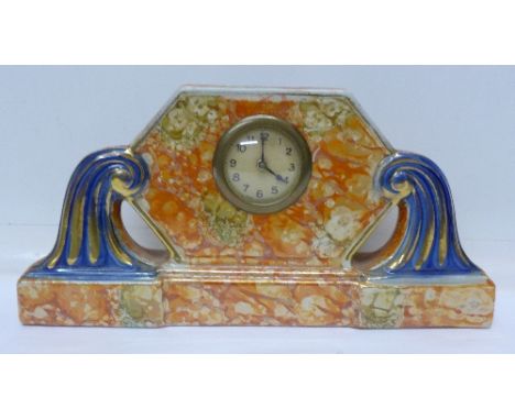 A French Art Deco mantel clock, width 31cm
