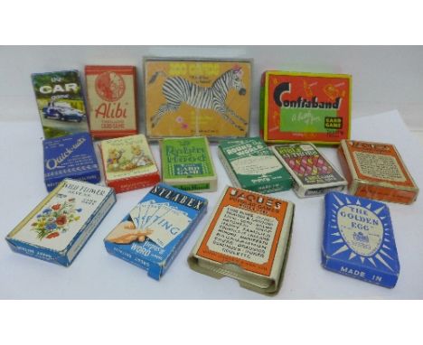 Twelve packs of vintage playing cards and card games