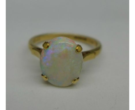 A 9ct gold and opal ring, 2.9g, O