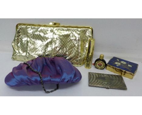 A Stratton musical compact, a Stad Gent plated card case, perfume, lipstick and two clutch bags