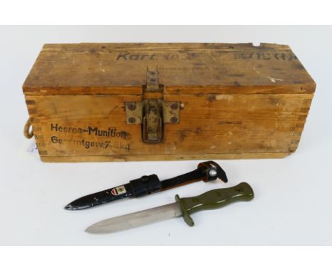 A World War Two (WW2 / WWII) German ammunition crate and a post war German fighting knifeNote: This lot is not for sale to pe