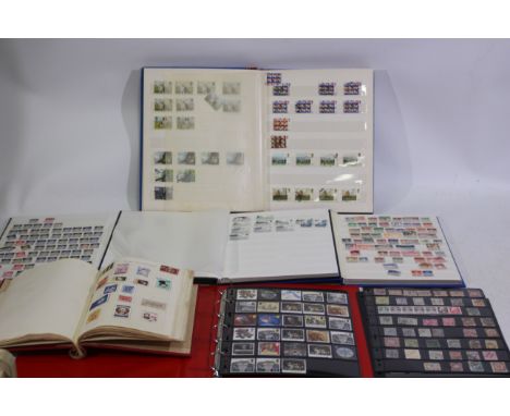 Philately - A collection of UK and foreign stamps, Victorian and later, housed in albums / binders.