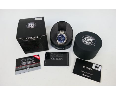 A Citizen Eco-Drive chronograph H500-S0082005, boxed with paperwork.