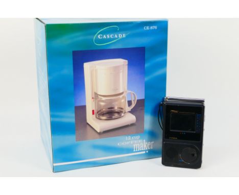 An unused Cascade 12 Cup Coffee Maker, contained in original box and shipping box and a vintage Proline LCD Pocket Colour Tel