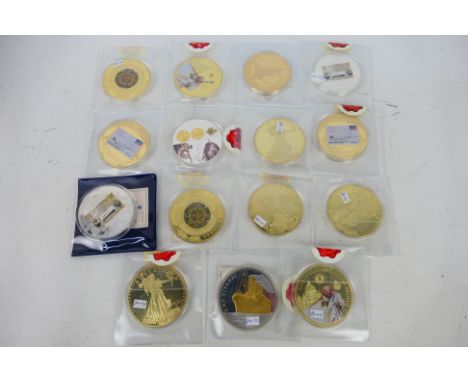 A collection of Windsor Mint large scale commemorative coins / medallions to include US coins, Concorde related, Titanic rela