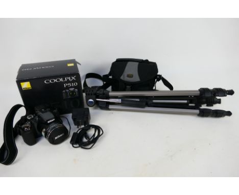 Photography - A Nikon P510 camera with original box, instructions, charger, tripod and camera bag.