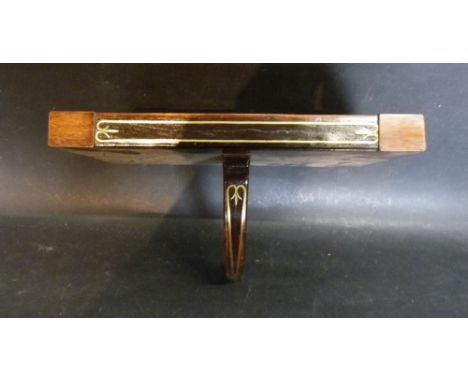 A Mahogany and Brass Inlaid Clock Bracket