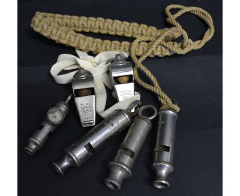 The Metropolitan J. Hudson & Co. Whistle together with five other whistles to include The Acme Scoutmaster, The EMCA City Whi