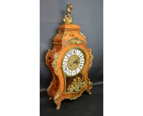 A Louis XV Style Marquetry Inlaid and Gilt Metal Mounted Bracket Clock, the brass dial with enamel Roman numerals with two tr
