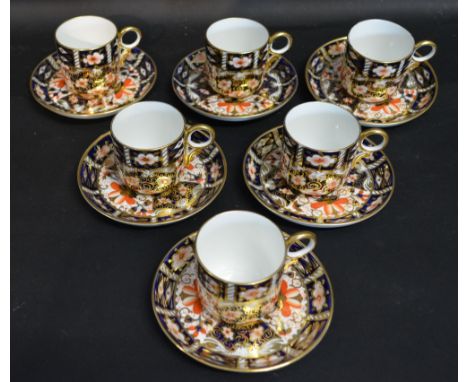 A Set of Six Royal Crown Derby Coffee Cans and Saucers decorated in the Imari palette