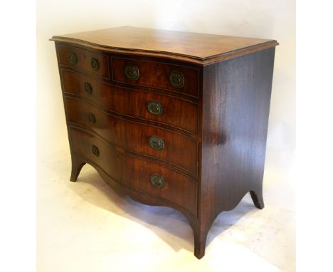 A George III Mahogany Serpentine Commode, the moulded top above two short and three long graduated drawers with brass handles