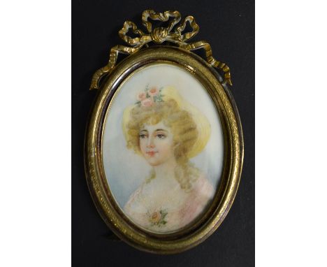 An Early 20th Century Oval Portrait Miniature, Portrait of a Lady in Period Dress within a gilded ribbon mounted frame, 6.5 x