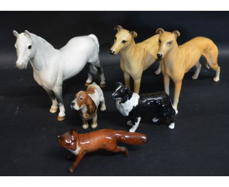 A Beswick Model of a Welsh Mountain Pony together with two Beswick models of Dogs, a Beswick model of a Fox and two other mod