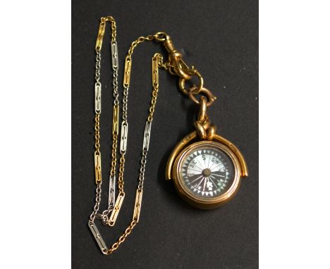 An 18ct. Gold Swivel Fob with Compass and Initials, together with an 18ct. bi-gold linked chain