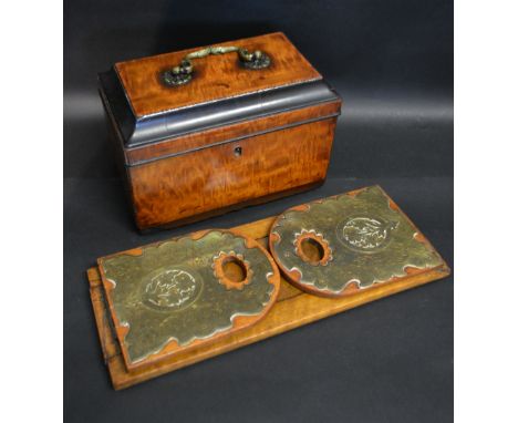 A 19th Century Satinwood Tea Caddy, the hinged cover with brass carrying handle enclosing a fitted interior together with a V