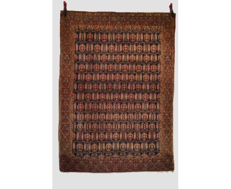 Esfahan rug, central Persia, circa 1930s, 6ft. 6in. X 4ft. 10in. 1.98m. X 1.47m. Small spots of old moth damage. Dark blue fi
