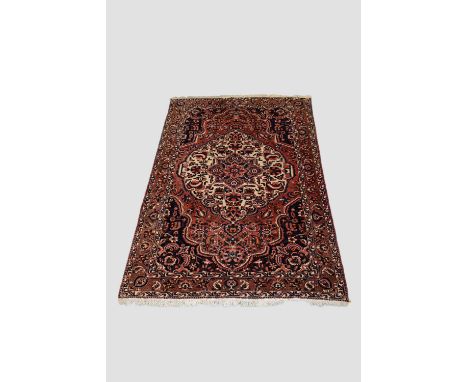 Jozan carpet, Hamadan area, north west Persia, inscribed and dated 1352 (AH) [1933 AD], 10ft. 1in. X 6ft. 9in. 3.07m. X 3.07m