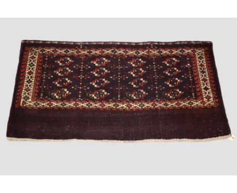 Yomut Turkmen 4 x 4 gul chuval, Turkmenistan, early 20th century, 2ft. 2in. X 4ft. 0.66m. x 1.22m. The guls divided by colour