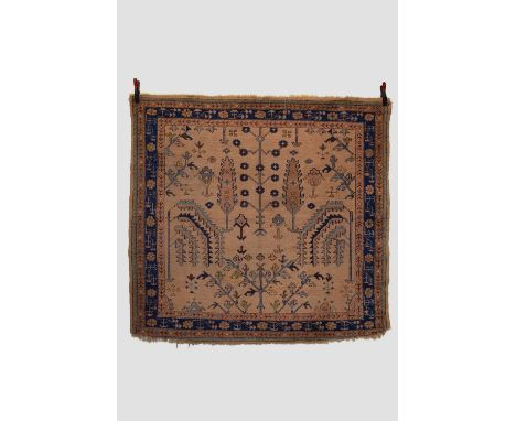 Ushak rug, west Anatolia, early 20th century, 5ft. 7in. X 6ft. 1.70m. X 1.83m. Overall wear with losses to lower end. Light b