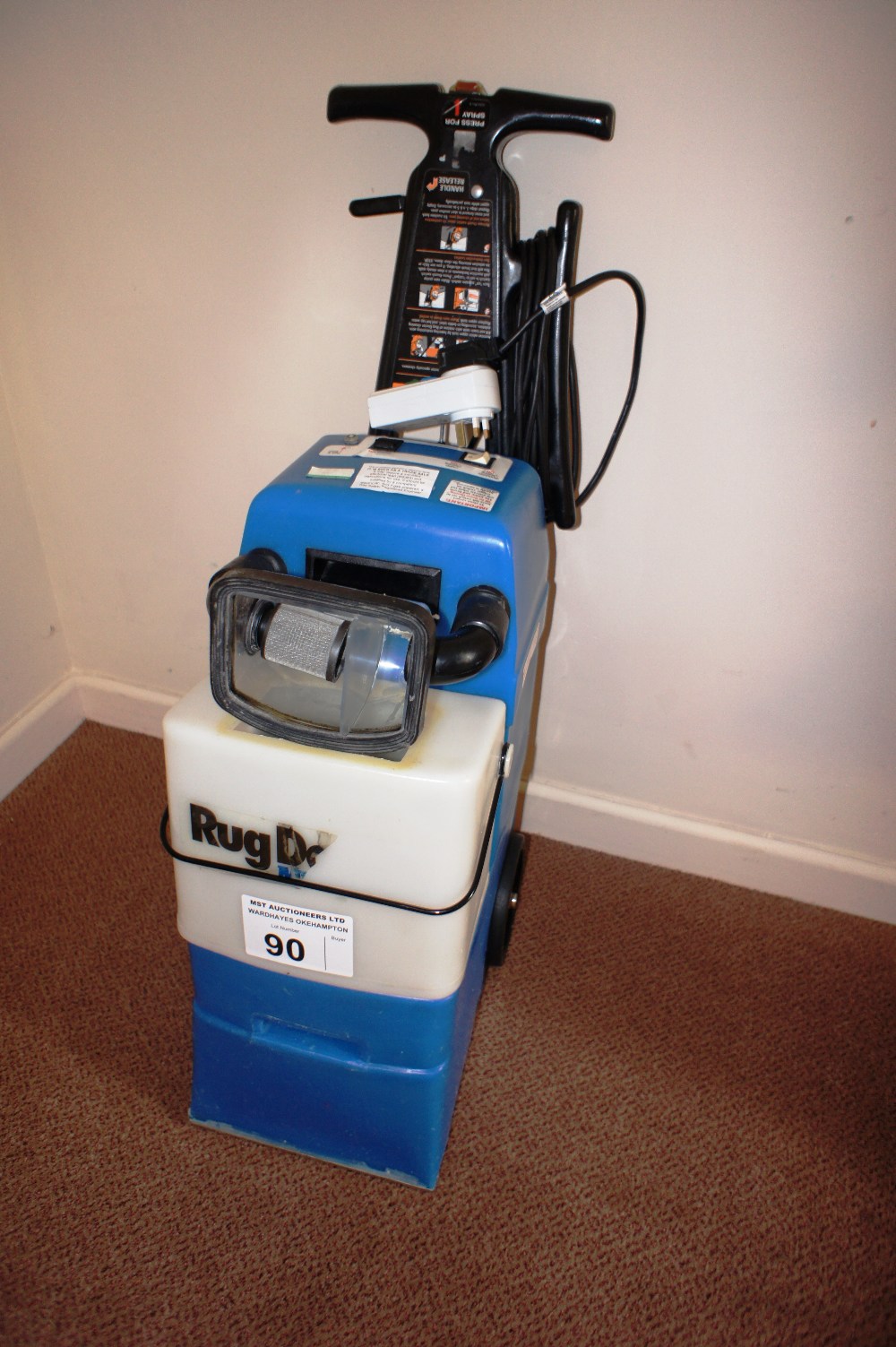 a Rug Doctor EZ1 MPC2 carpet cleaning machine (located in hallway)