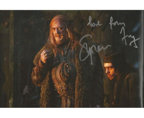 Stephen Fry signed 12x8 The Hobbit colour photo. Stephen John Fry (born 24 August 1957) is an English actor, comedian and wri