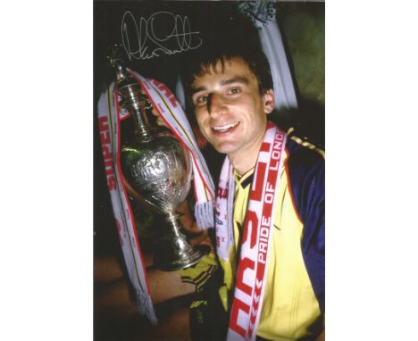 ALAN SMITH 1989, football autographed 12 x 8 photo, a superb image depicting the Arsenal centre-forward celebrates in the dre