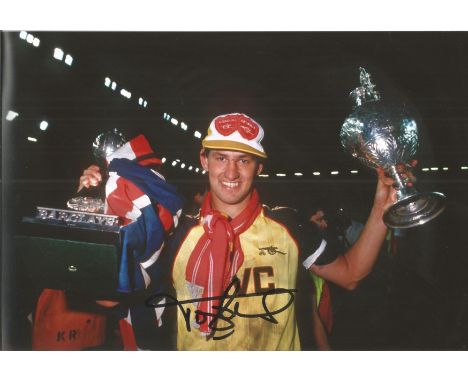 TONY ADAMS signed Arsenal 8x12 Photo. All autographs come with a Certificate of Authenticity. We combine postage on multiple 