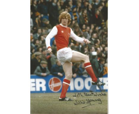 WILLIE YOUNG signed Arsenal 8x12 Photo. All autographs come with a Certificate of Authenticity. We combine postage on multipl
