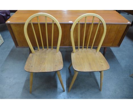 A pair of Ercol Blonde elm and beech Windsor chairs 