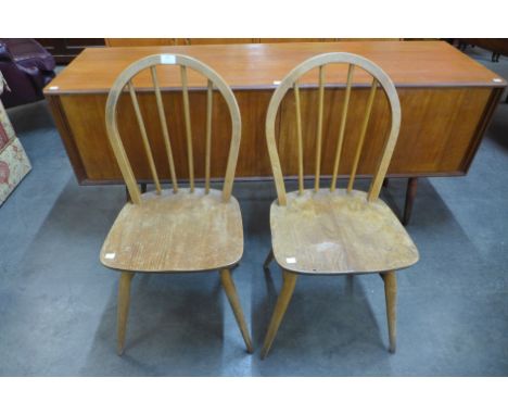 A pair of Ercol Blonde elm and beech Windsor chairs 