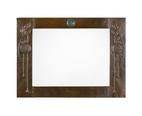 GLASGOW STYLE  ARTS & CRAFTS COPPER WALL MIRROR, CIRCA 1900   of rectangular form, the hammered surface inset with a Ruskin r