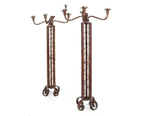 CONTINENTAL SCHOOL  PAIR OF LARGE ART DECO WROUGHT IRON FLOOR LAMPS, CIRCA 1930   each with four scrolling branches, raised o