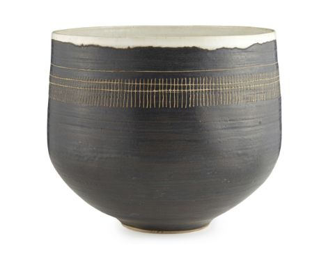 [§] LUCIE RIE (1902-1995)  LARGE HAND-THROWN CERAMIC BOWL, MID-20TH CENTURY   of cylindrical form, the exterior covered in a 