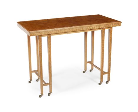 ATTRIBUTED TO GEORGE MONTAGUE ELLWOOD  SATIN BIRCH CONSOLE TABLE, CIRCA 1915   the rectangular top raised above a moulded fri