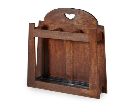 MANNER OF GEORGE WALTON  OAK STICK STAND, CIRCA 1900   the back with heart piercing above tapering sides with a tole liner  7