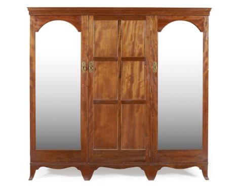 HEAL & SON, LONDON  MAHOGANY 'YEWDEN' WARDROBE, MODEL NO. 409, 1920S   the moulded cornice above central panelled door flanke