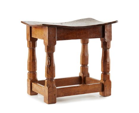 ROBERT 'MOUSEMAN' THOMPSON (1876-1955)  OAK AND BURR OAK STOOL, CIRCA 1940  the dished top raised on four shaped column legs,