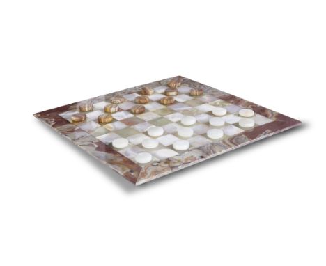 DRAUGHTS SET An onyx draughts set. Italy. 50 x 50cm