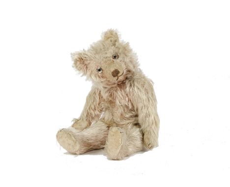 A German pink mohair Teddy Bear, probably Cramer, 1930s, with clear and black glass eye with remains of brown painted back, p