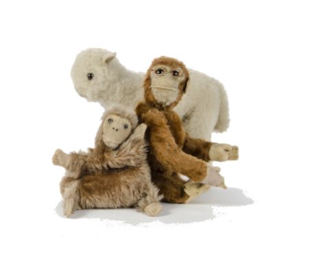 A Schuco yes/no monkey, 1930s, with brown mohair, orange and black glass eyes, felt face, ears, hands and feet, white mohair 