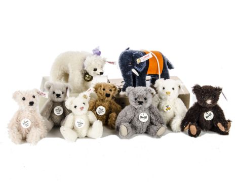 Ten Steiff Club Gift miniature Teddy Bears 2001 to 2011, one an elephant and one a crib bear, in original boxes with outer bo