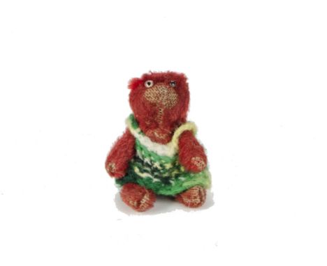 A Farnell red mohair ‘soldier’ Teddy bear, 1st world war, with clear and black glass eye, pipe - cleaner ears, swivel head, p