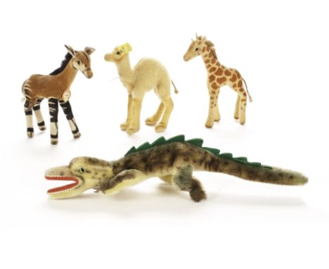 Steiff post - war Wild Animals: a small Dromedary camel with script button, yellow cloth tag and chest tag - 6in. (15cm.) hig
